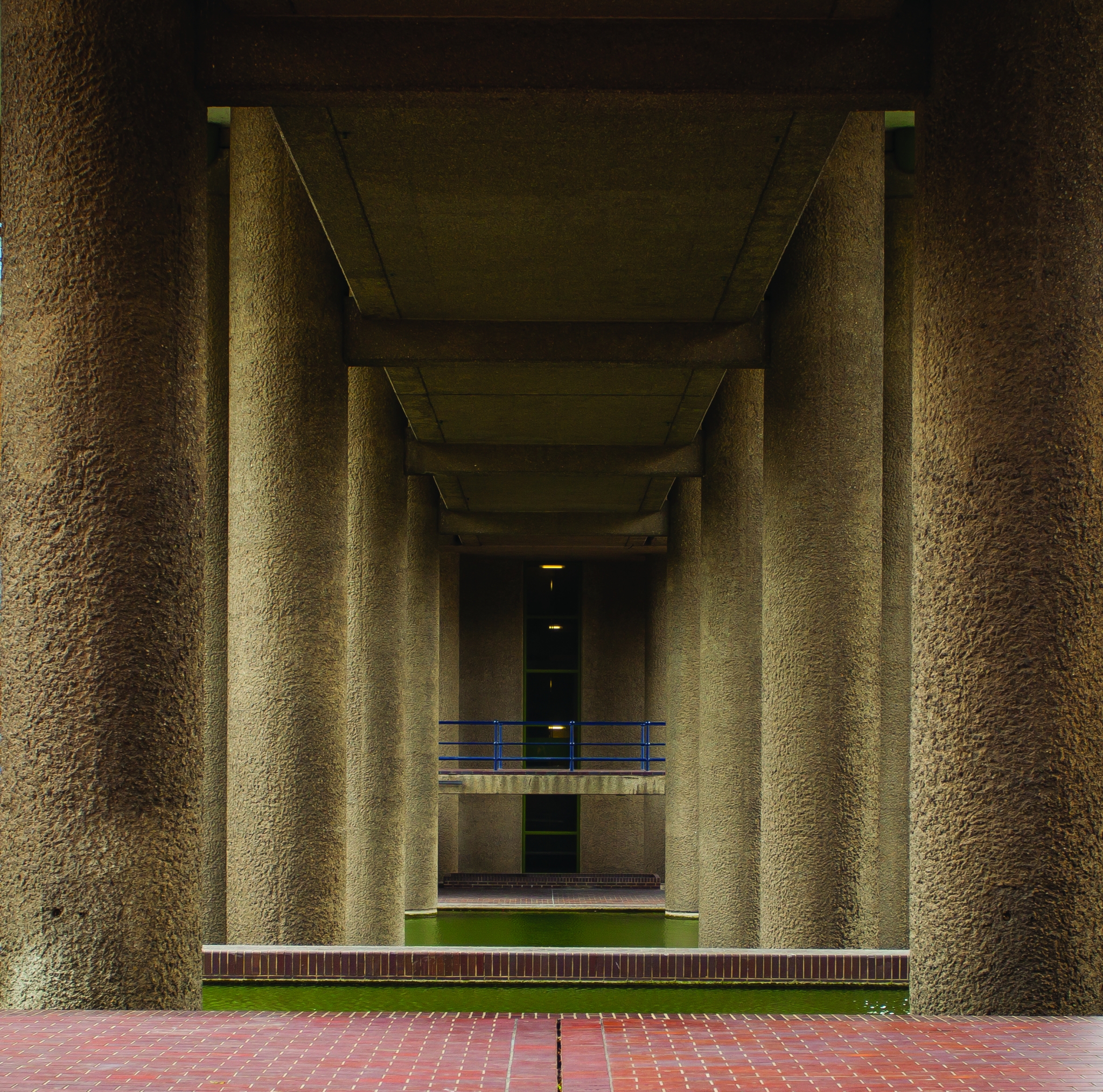 Columns, walkways and pond areas of the the Barbican centre as an example of Brutalist architecture